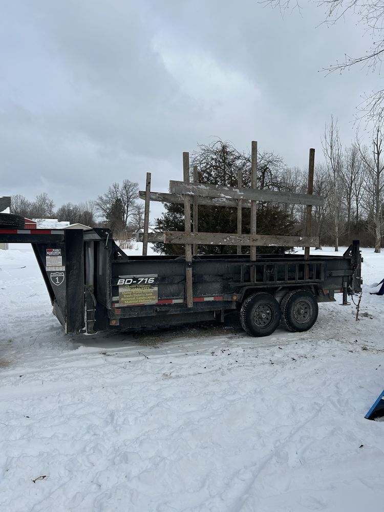 Clutter Cleaners trailer loaded with construction debris and specialty cleanup materials